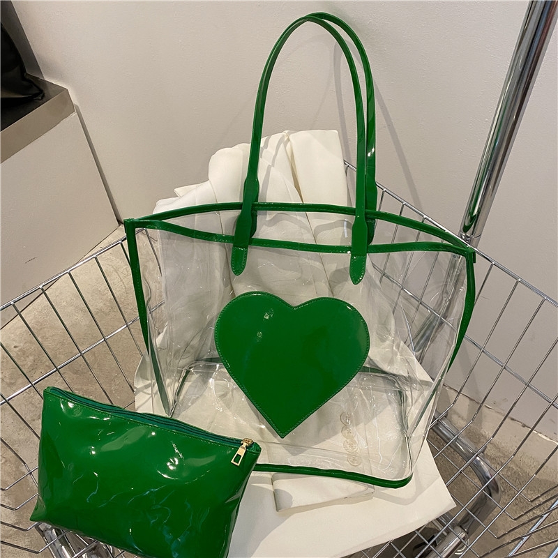 https://baginning.com/media/catalog/product/cache/17f7930b9630993becbd36a7c8a76b30/h/e/heart_pvc_large_tote_bag_clear_totes_with_inner_pouch_16_.jpg