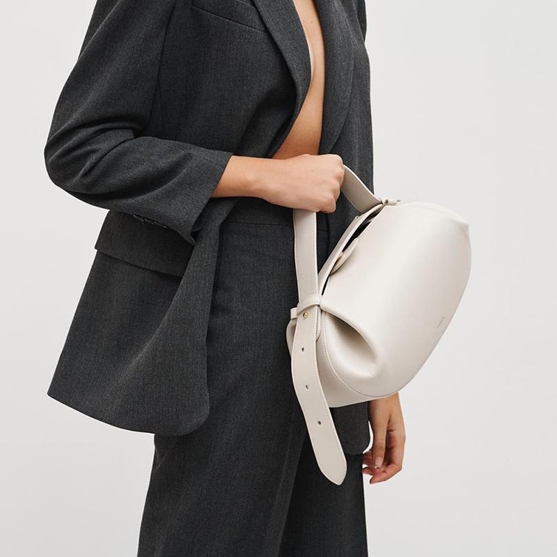 Buy Globus Women White Solid Sling Bag at Amazon.in