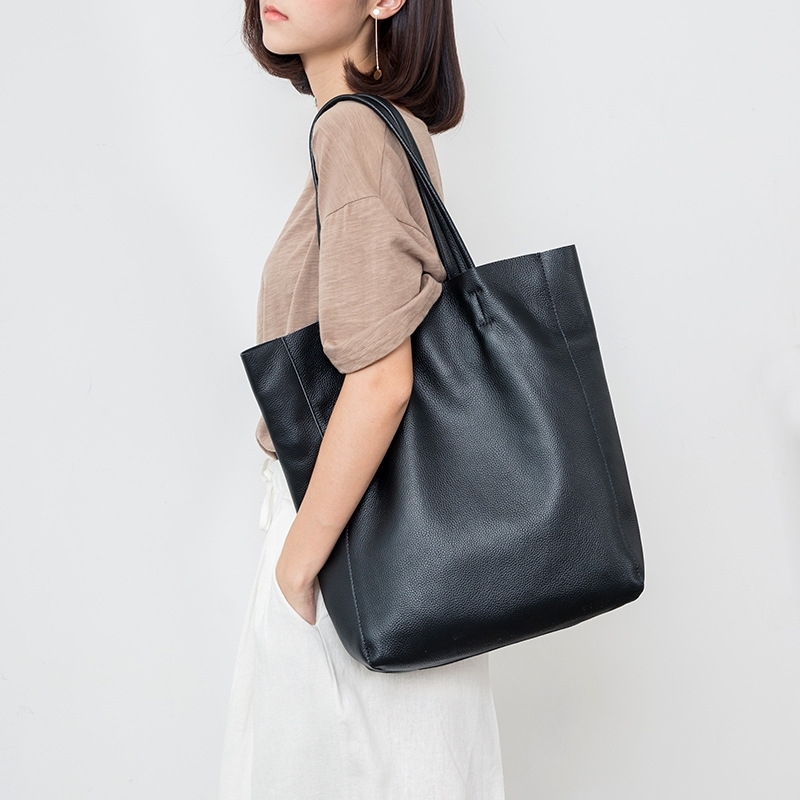 Women's Vertical Black Leather Tote Bags for Work | Baginning