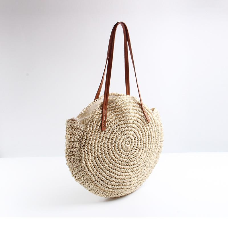 Beige Straw Tote with Leather Handles for Summer Travel 